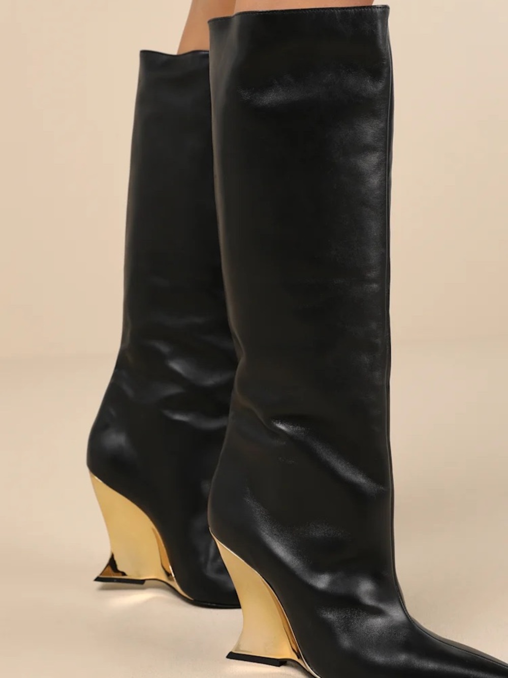 Siena Black and Gold Leather Knee-High Wedge Boots
Schutz size 6.5